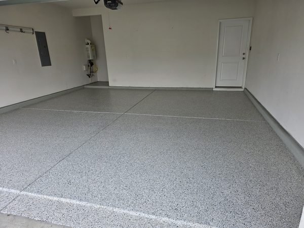 Clean 2-car residential garage with light grey flake epoxy floor finish, Mooresville NC