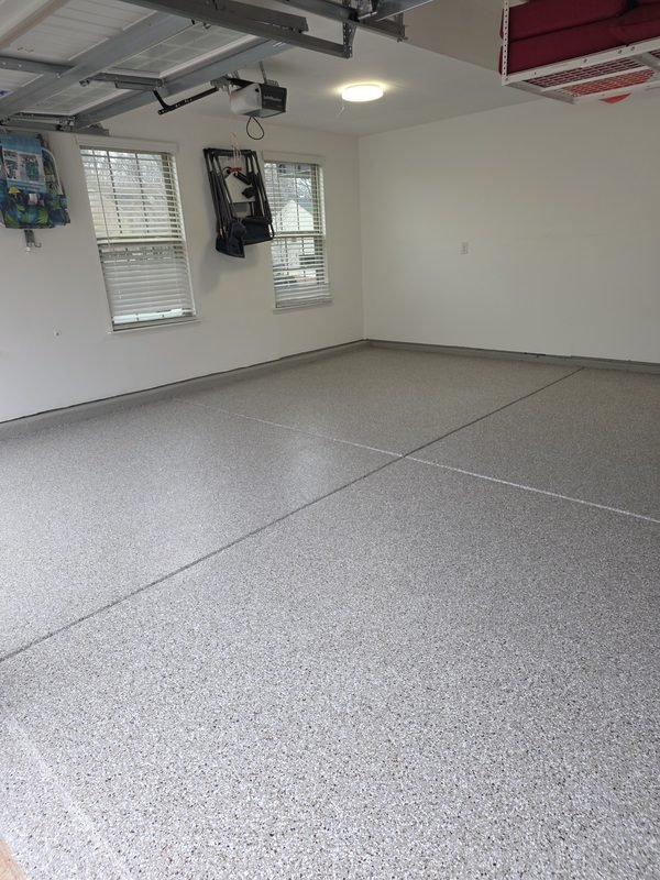 Same garage after epoxy installation with light flake floor finish, Mooresville NC