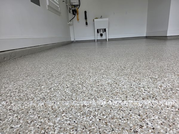 Two-car residential garage with multi-tone flake epoxy floor, view three, Mooresville NC