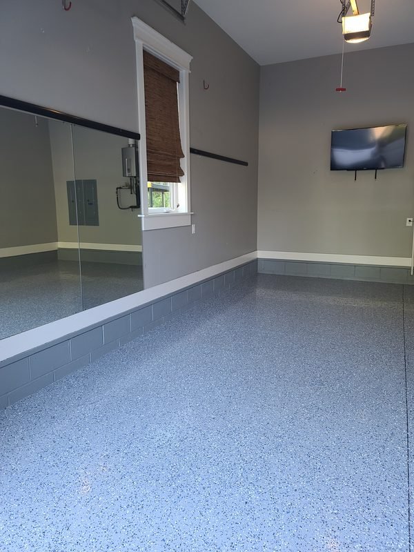 Two-car residential garage with smooth flake epoxy floor finish, Lake Norman NC