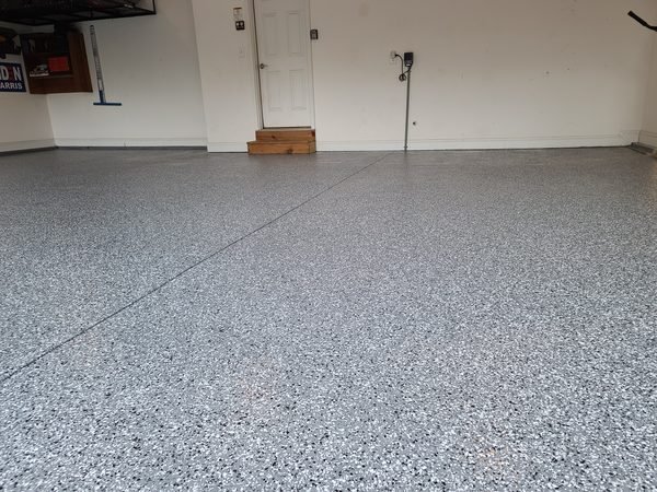 Two-car residential garage with grey-tone flake epoxy floor coating, Mooresville NC
