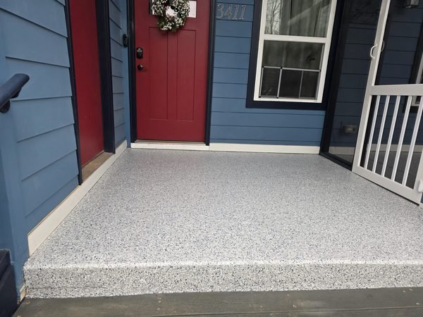 Front porch with red door and light flake epoxy coating, residential entryway, Mooresville NC