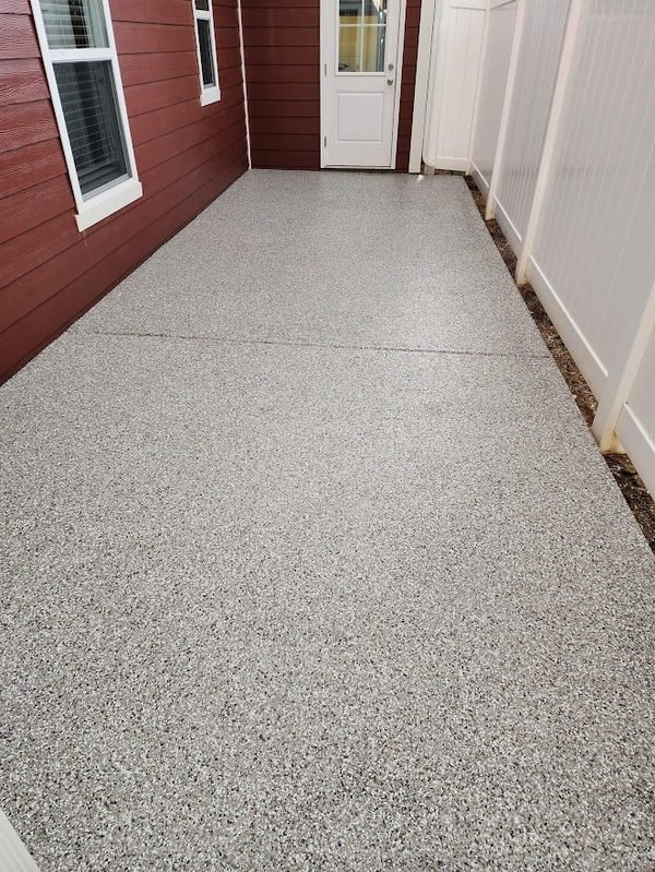 Exterior walkway with light grey and tan flake epoxy coating, residential property, Lake Norman NC