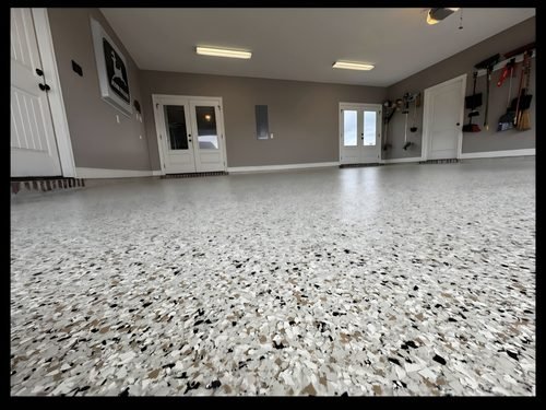 Charles and Dawn Jones's finished cream-and-black flake epoxy garage floor, Mooresville NC
