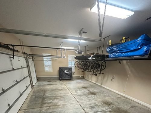 Joe Auborn's garage floor before epoxy installation, bare concrete, Lake Norman NC