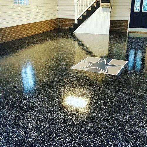 Cray and Raven Carpenter's finished epoxy garage floor with COWBOYS star detail, Mooresville NC