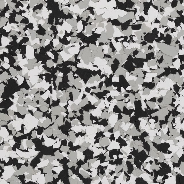 Domino &mdash; High-contrast black, granite, and white. Sharp, modern, and graphic.